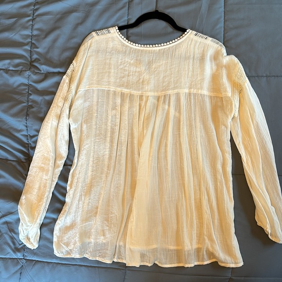 White tunic top with cute detail. Sheer and fits loose. - Picture 2 of 5